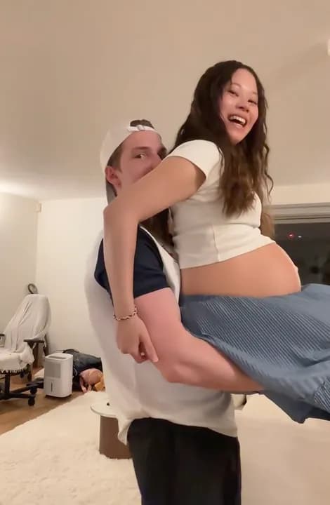 Danish guy shows off petite pregnant korean wife